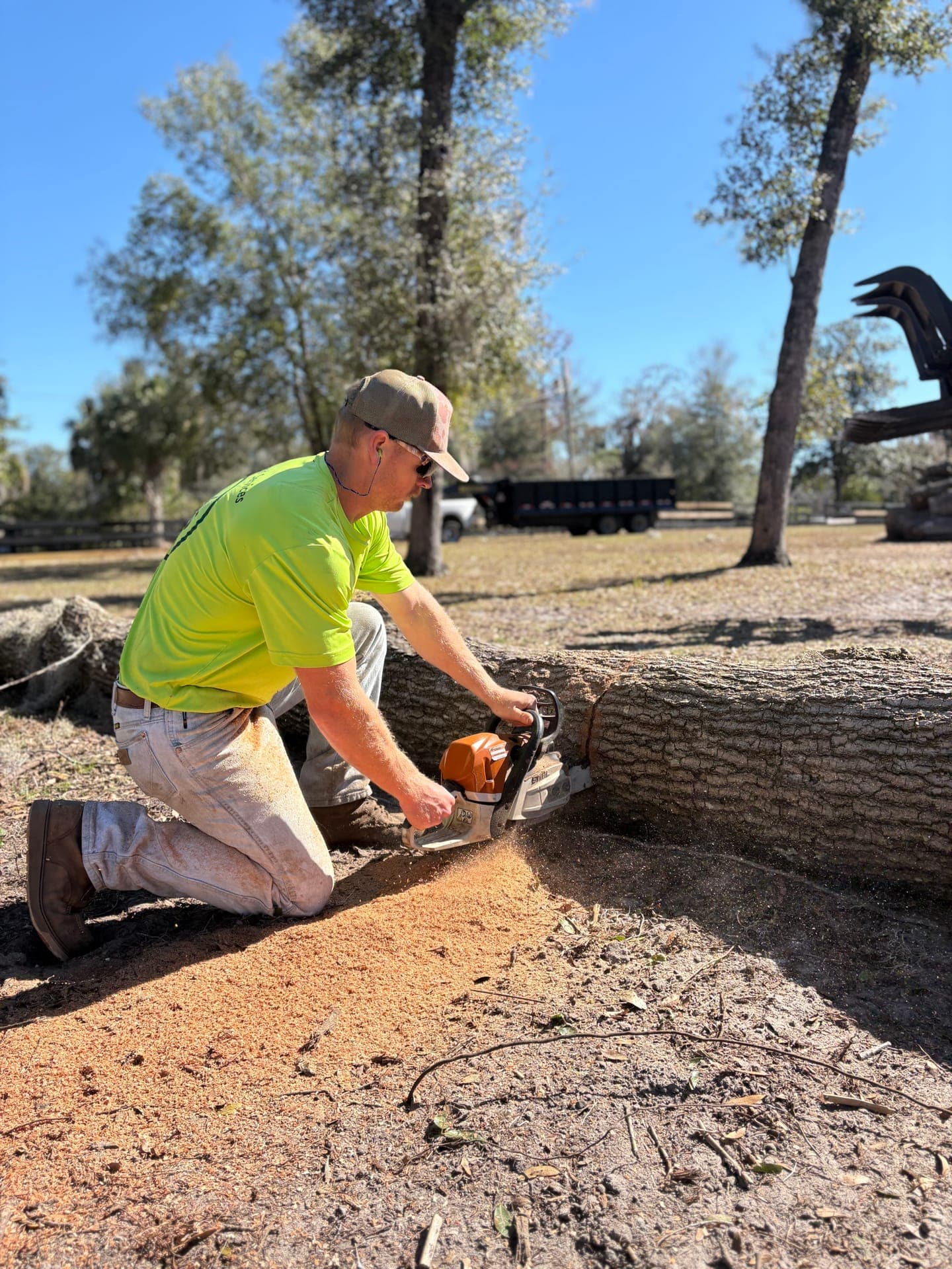 Section of trunk being lowered with ropes